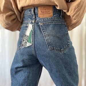 Vintage Levi’s 512 mid blue jeans with patchwork repairs handmade quilt